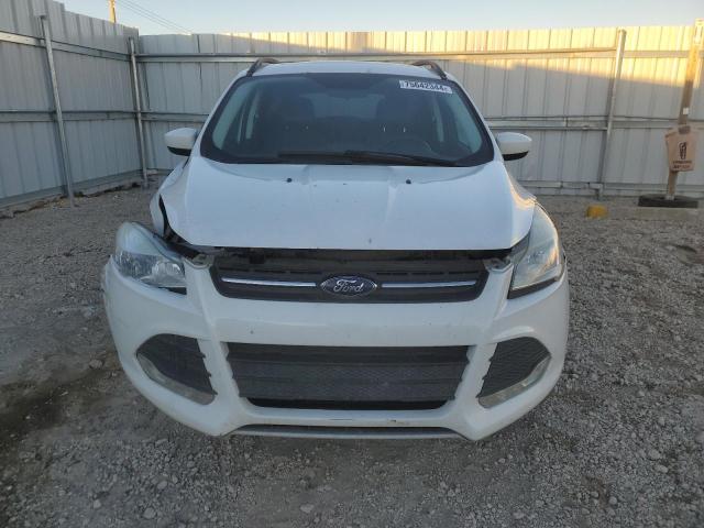 Photo 5 from auction – 2016 FORD ESCAPE SE with VIN 1FMCU9GX0GUA46340