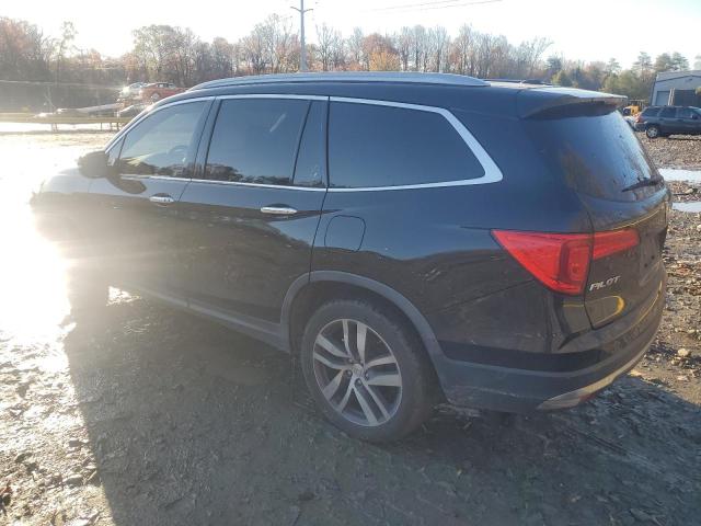 Photo 2 from auction – 2018 HONDA PILOT ELIT with VIN 5FNYF6H06JB053975