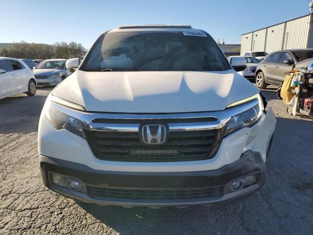 Photo 5 from auction – 2018 HONDA RIDGELINE with VIN 5FPYK3F77JB017343