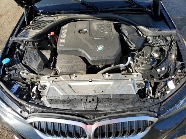 Photo 11 from auction – 2023 BMW 330I with VIN 3MW69FF00P8D14867