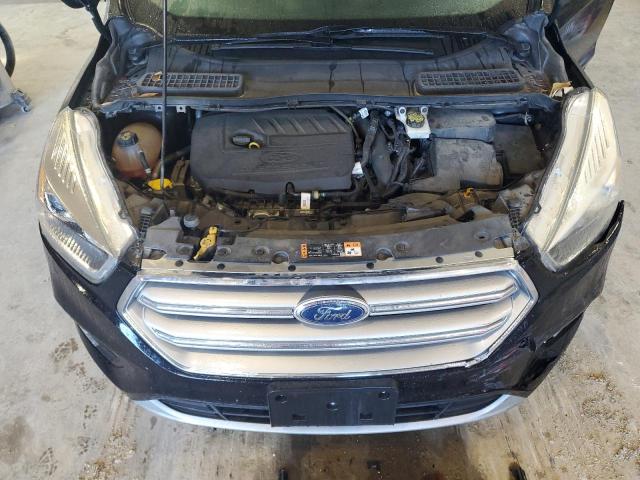 Photo 12 from auction – 2017 FORD ESCAPE SE with VIN 1FMCU9GD4HUC49657
