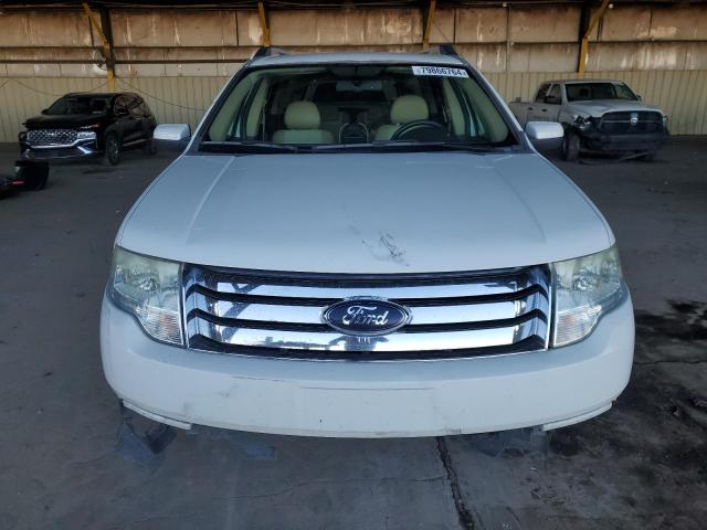 Photo 5 from auction – 2009 FORD TAURUS X E with VIN 1FMDK07W19GA06041