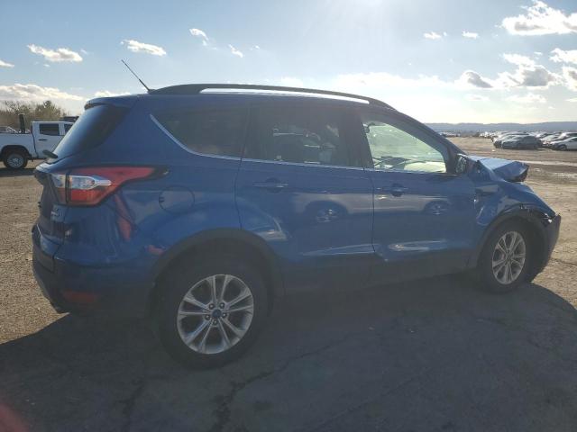 Photo 3 from auction – 2018 FORD ESCAPE SE with VIN 1FMCU9GD1JUC03578