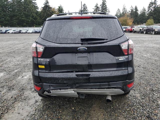 Foto 6 de la subasta – 2018 FORD ESCAPE TIT con VIN 1FMCU9J96JUA04871