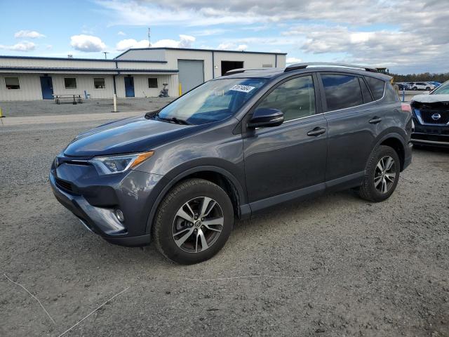 TOYOTA RAV4 XLE 2017 with VIN JTMRFREV1HD214725 - Photo from auction