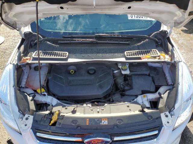 Photo 12 from auction – 2015 FORD ESCAPE TIT with VIN 1FMCU9J99FUA06203