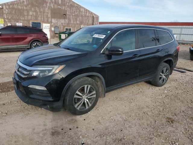 HONDA PILOT EXL 2016 with VIN 5FNYF6H59GB021963 - Photo from auction