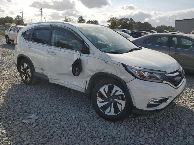 Photo 4 from auction – 2015 HONDA CR-V TOURI with VIN 5J6RM4H97FL131630