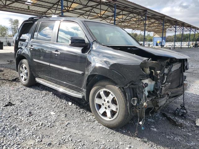 Photo 4 from auction – 2011 HONDA PILOT TOUR with VIN 5FNYF4H95BB022785
