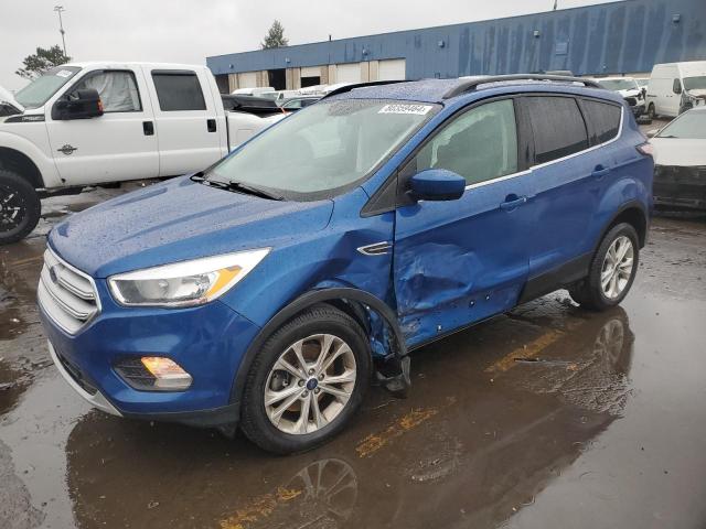 FORD ESCAPE SE 2018 with VIN 1FMCU9GD0JUA71087 - Photo from auction