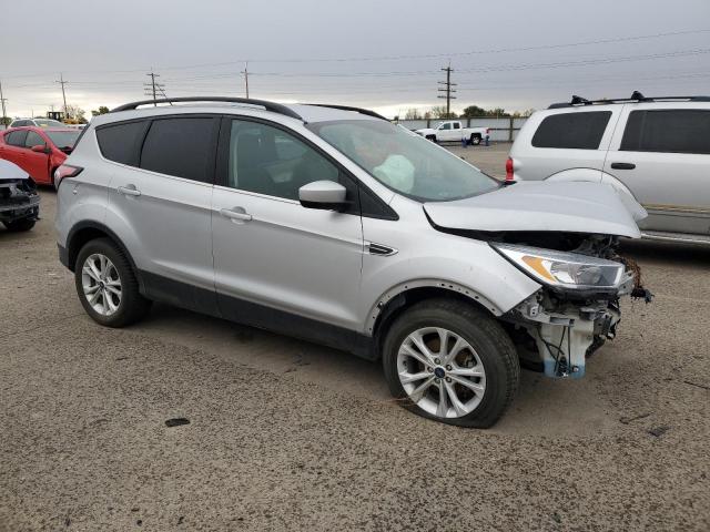 Photo 4 from auction – 2018 FORD ESCAPE SE with VIN 1FMCU0GD1JUD38264