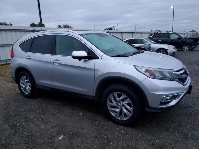 Photo 4 from auction – 2015 HONDA CR-V EXL with VIN 2HKRM4H73FH602021