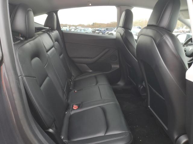 Photo 11 from auction – 2021 TESLA MODEL Y with VIN 5YJYGDEE4MF174283