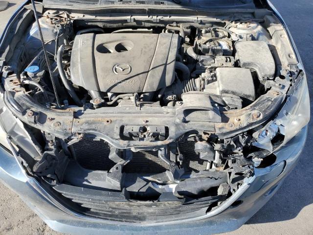 Photo 11 from auction – 2015 MAZDA 3 SV with VIN JM1BM1T70F1228921