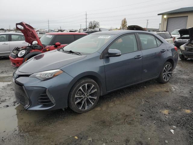 TOYOTA COROLLA L 2018 with VIN 2T1BURHE5JC000245 - Photo from auction
