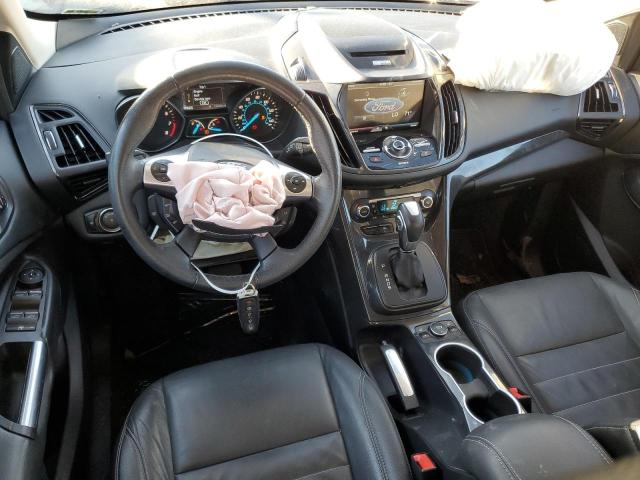 Photo 8 from auction – 2014 FORD ESCAPE TIT with VIN 1FMCU0JX3EUE37354