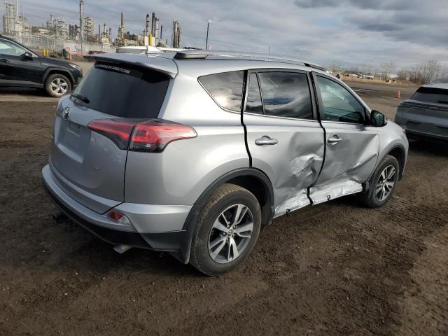 Photo 3 from auction – 2018 TOYOTA RAV4 LE with VIN 2T3ZFREV2JW520423