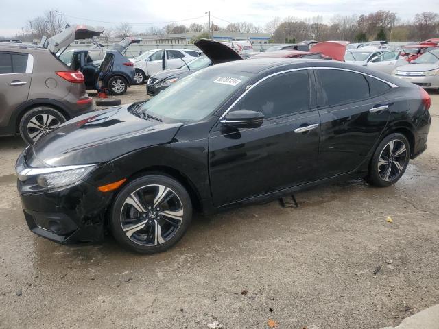 HONDA CIVIC TOUR 2016 with VIN 19XFC1F99GE023923 - Photo from auction