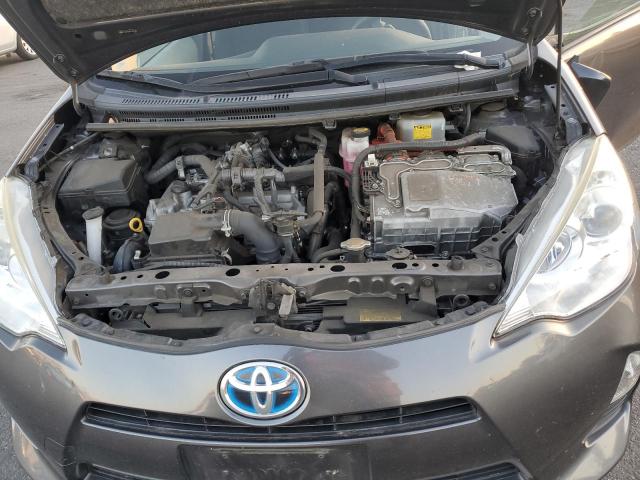 Photo 11 from auction – 2014 TOYOTA PRIUS C with VIN JTDKDTB3XE1086120