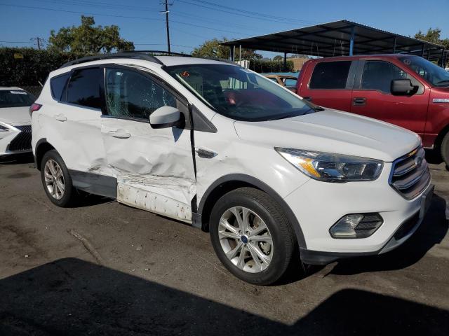 Photo 4 from auction – 2018 FORD ESCAPE SE with VIN 1FMCU9GD4JUC37594