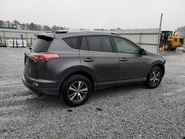 Photo 3 from auction – 2017 TOYOTA RAV4 XLE with VIN JTMRFREV5HJ704554