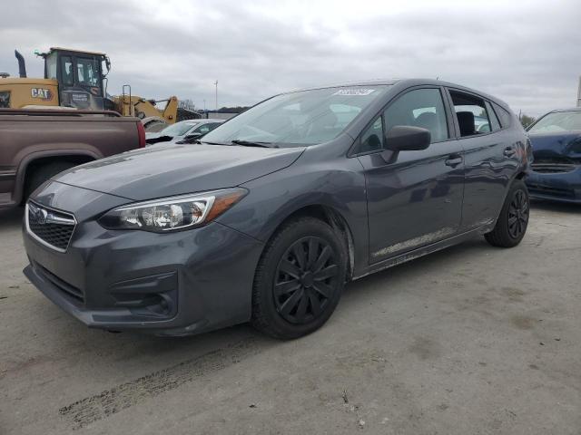 SUBARU IMPREZA 2018 with VIN 4S3GTAA62J3706045 - Photo from auction