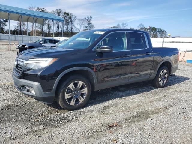 HONDA RIDGELINE 2017 with VIN 5FPYK3F65HB018749 - Photo from auction