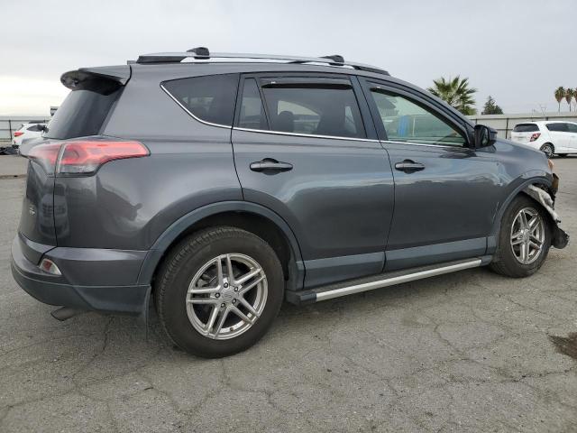 Photo 3 from auction – 2017 TOYOTA RAV4 LE with VIN JTMBFREV0HJ110486