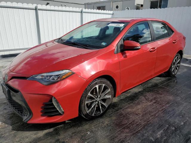 TOYOTA COROLLA L 2017 with VIN 2T1BURHE2HC857469 - Photo from auction