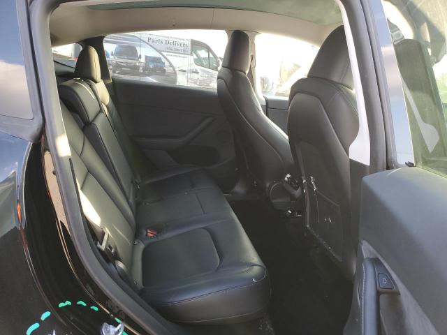 Photo 11 from auction – 2024 TESLA MODEL Y with VIN 7SAYGDEE7RA220504