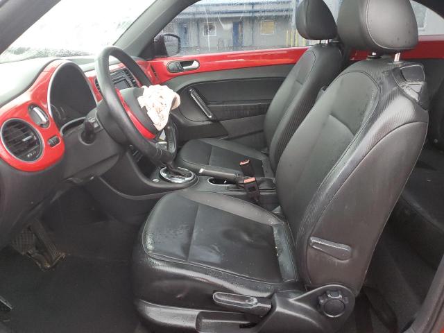 Photo 7 from auction – 2014 VOLKSWAGEN BEETLE with VIN 3VWJ17AT2EM637590