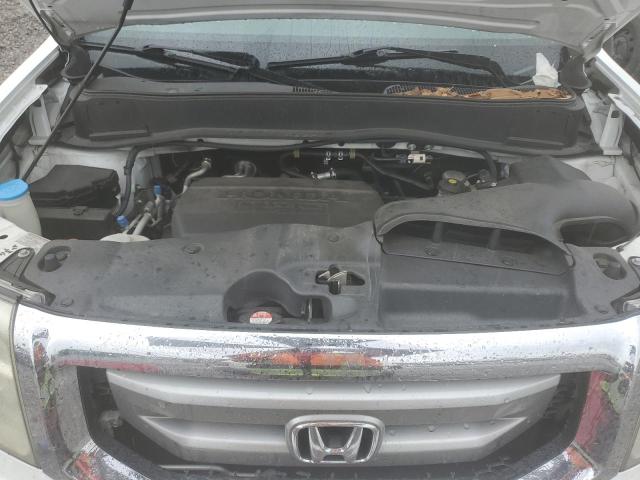 Photo 12 from auction – 2011 HONDA PILOT LX with VIN 5FNYF3H20BB046456