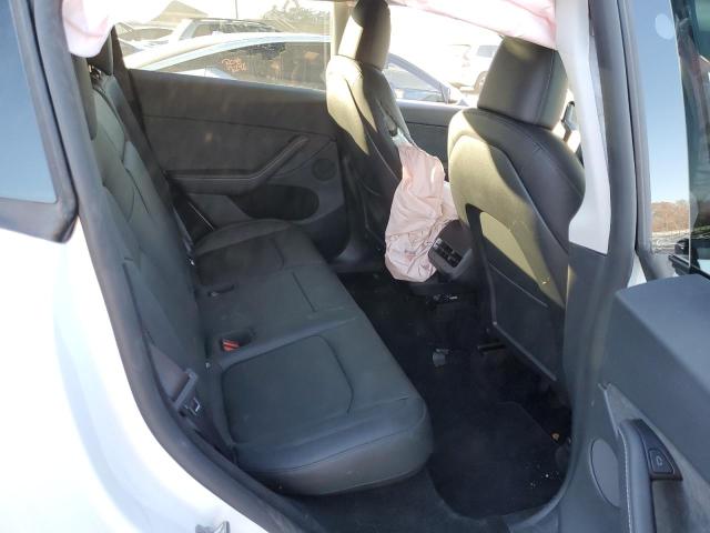 Photo 11 from auction – 2024 TESLA MODEL Y with VIN 7SAYGDEE4RA304716