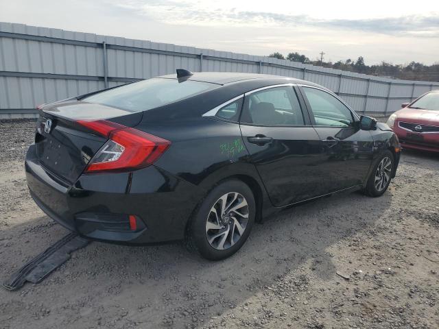 Photo 3 from auction – 2018 HONDA CIVIC EX with VIN 2HGFC2F74JH583950