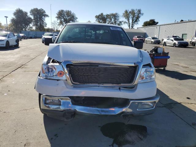 Photo 5 from auction – 2004 FORD F150 SUPER with VIN 1FTPW12514KC40910