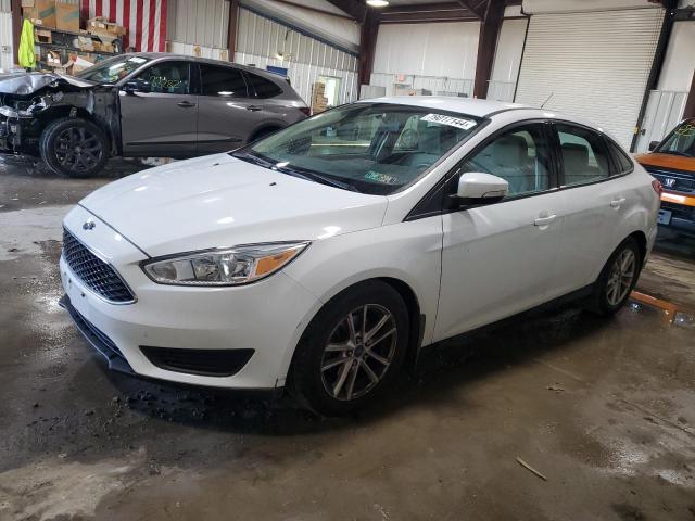FORD FOCUS SE 2016 with VIN 1FADP3F20GL243569 - Photo from auction