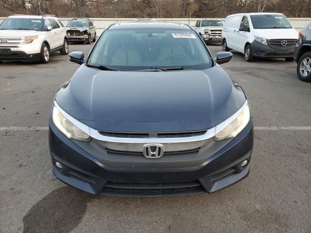 Photo 5 from auction – 2016 HONDA CIVIC EX with VIN 19XFC1F37GE024368