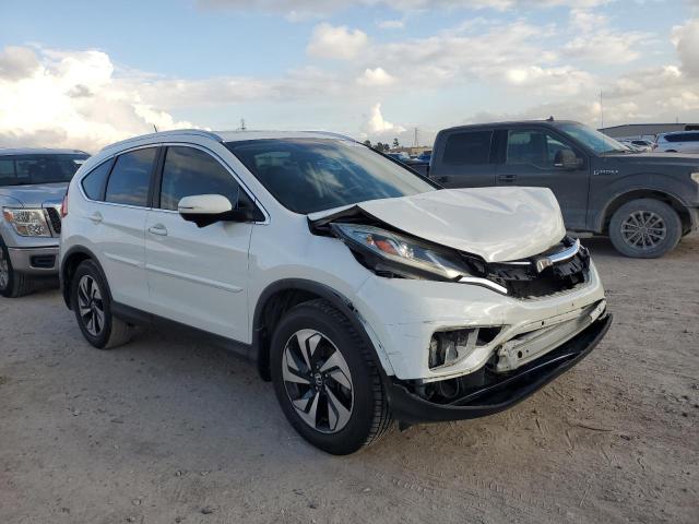 Photo 4 from auction – 2015 HONDA CR-V TOURI with VIN 5J6RM3H90FL007516