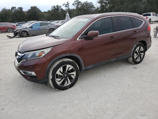 HONDA CR-V TOURI 2016 with VIN 5J6RM3H93GL008693 - Photo from auction