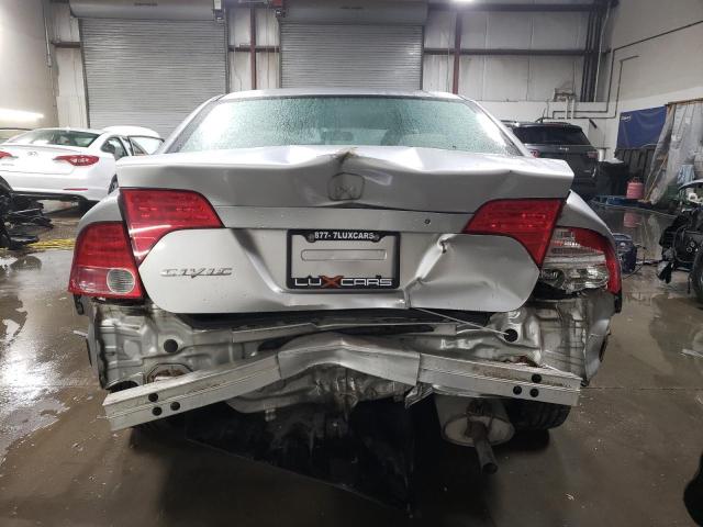 Photo 6 from auction – 2006 HONDA CIVIC LX with VIN 1HGFA16476L811908