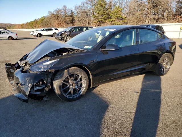 TESLA MODEL 3 2022 with VIN 5YJ3E1EAXNF352582 - Photo from auction