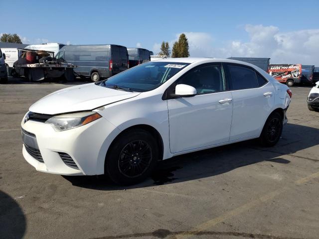 TOYOTA COROLLA L 2014 with VIN 5YFBURHE5EP101386 - Photo from auction
