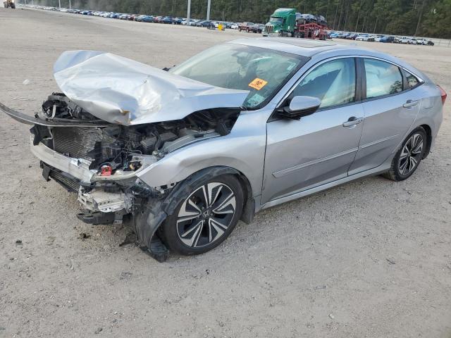 HONDA CIVIC EX 2017 with VIN 19XFC1F37HE011086 - Photo from auction