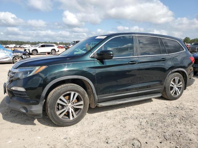 HONDA PILOT EXL 2016 with VIN 5FNYF6H50GB087026 - Photo from auction