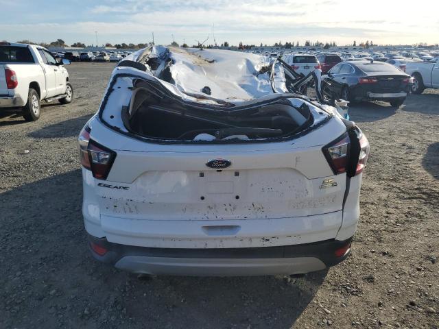 Photo 6 from auction – 2017 FORD ESCAPE SE with VIN 1FMCU9GD6HUD67533