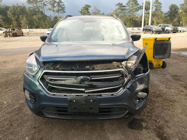 Photo 5 from auction – 2018 FORD ESCAPE SE with VIN 1FMCU0GD8JUC76152