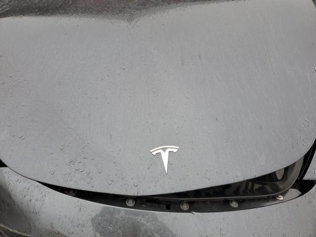 Photo 11 from auction – 2023 TESLA MODEL Y with VIN 7SAYGDEE3PF738531