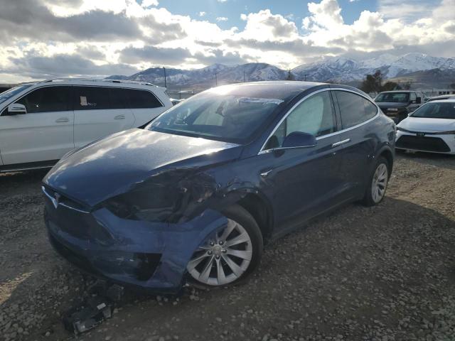 TESLA MODEL X 2018 with VIN 5YJXCAE29JF140945 - Photo from auction