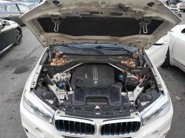Photo 12 from auction – 2014 BMW X5 XDRIVE3 with VIN 5UXKS4C55E0J94175