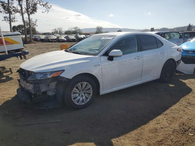 TOYOTA CAMRY LE 2021 with VIN 4T1C31AK2MU569081 - Photo from auction